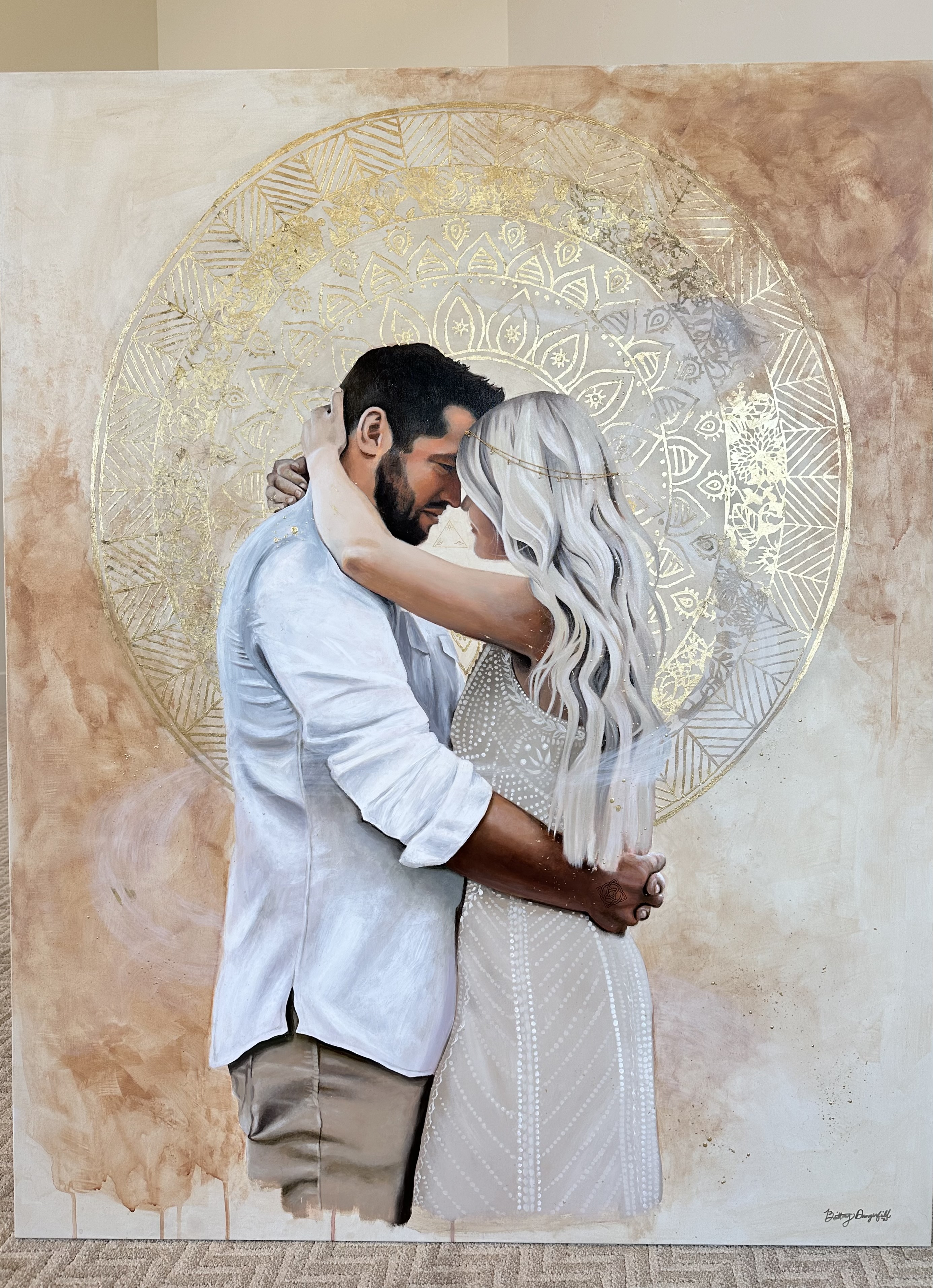 Wedding portrait with golden mandala halo