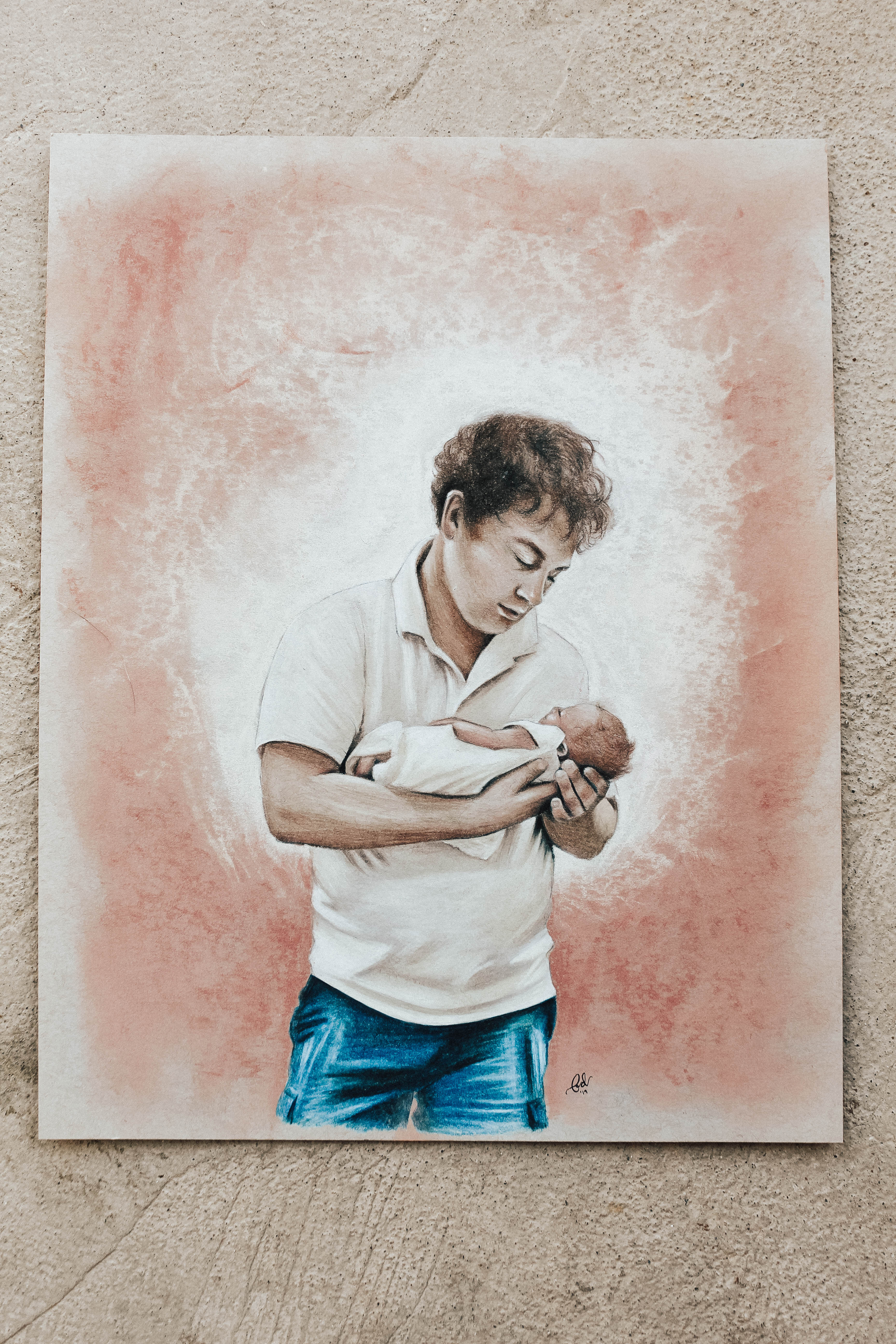 Father holding newborn