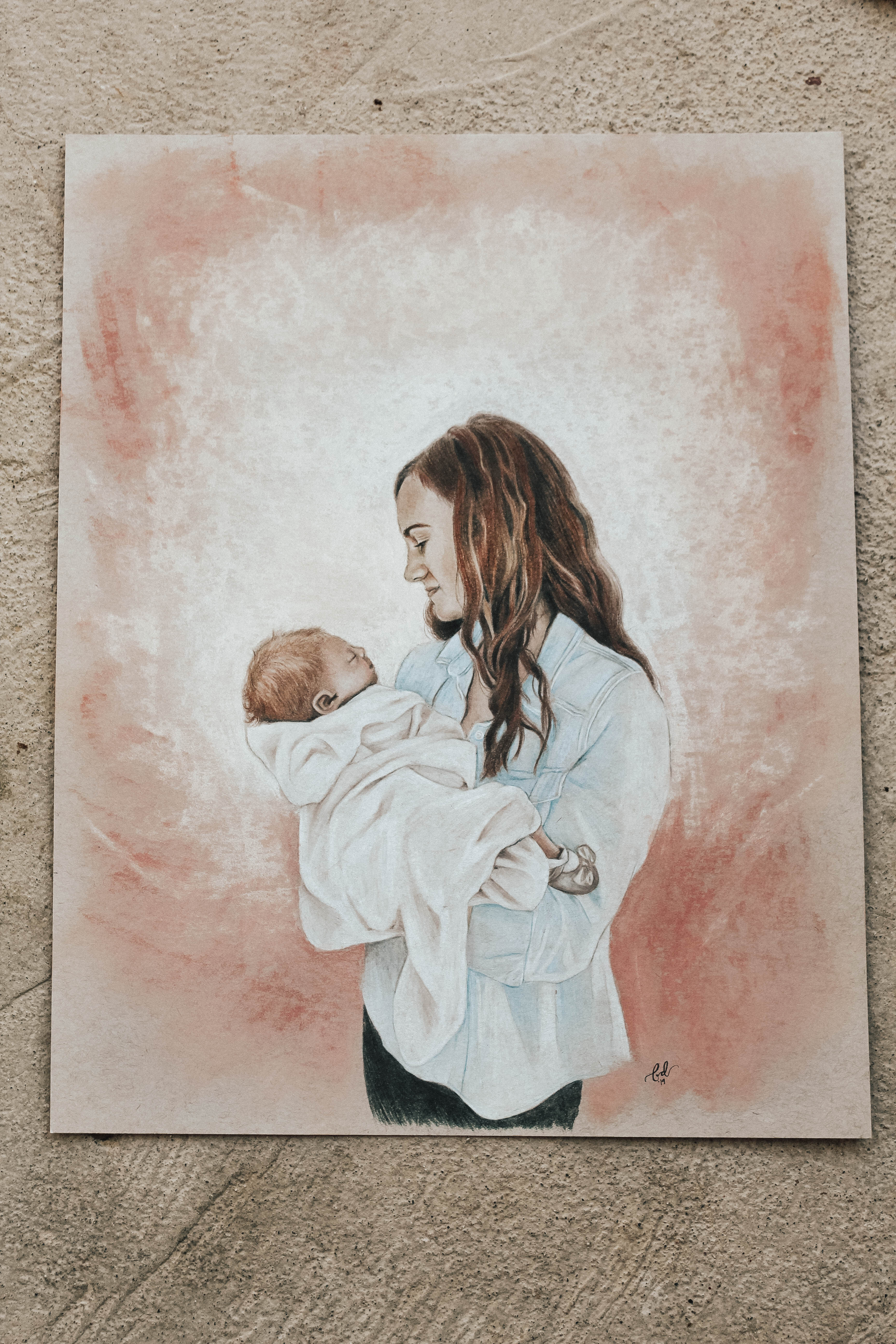 Mother cradling newborn